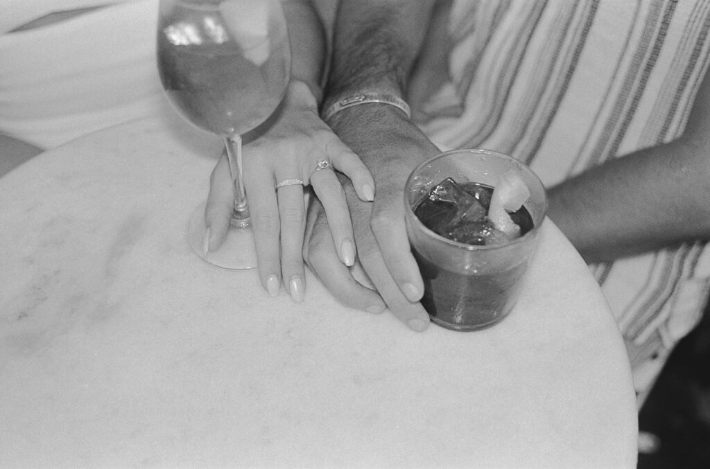 Casual engagement photos at Babas on Cannon in downtown Charleston