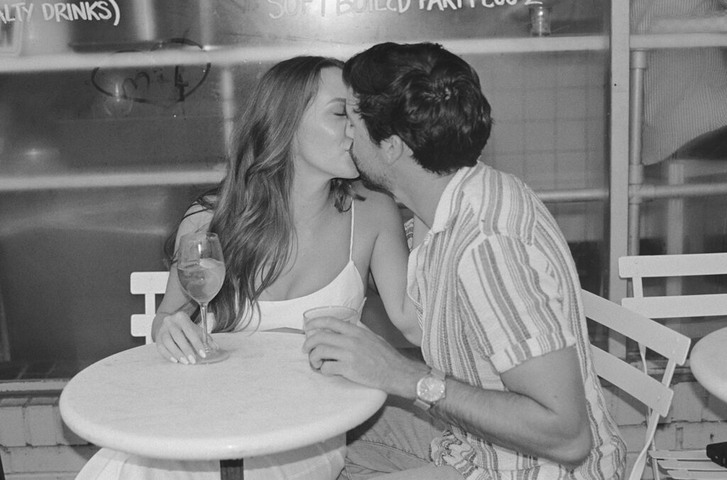 Documentary-style engagement photos at Babas on Cannon in Charleston