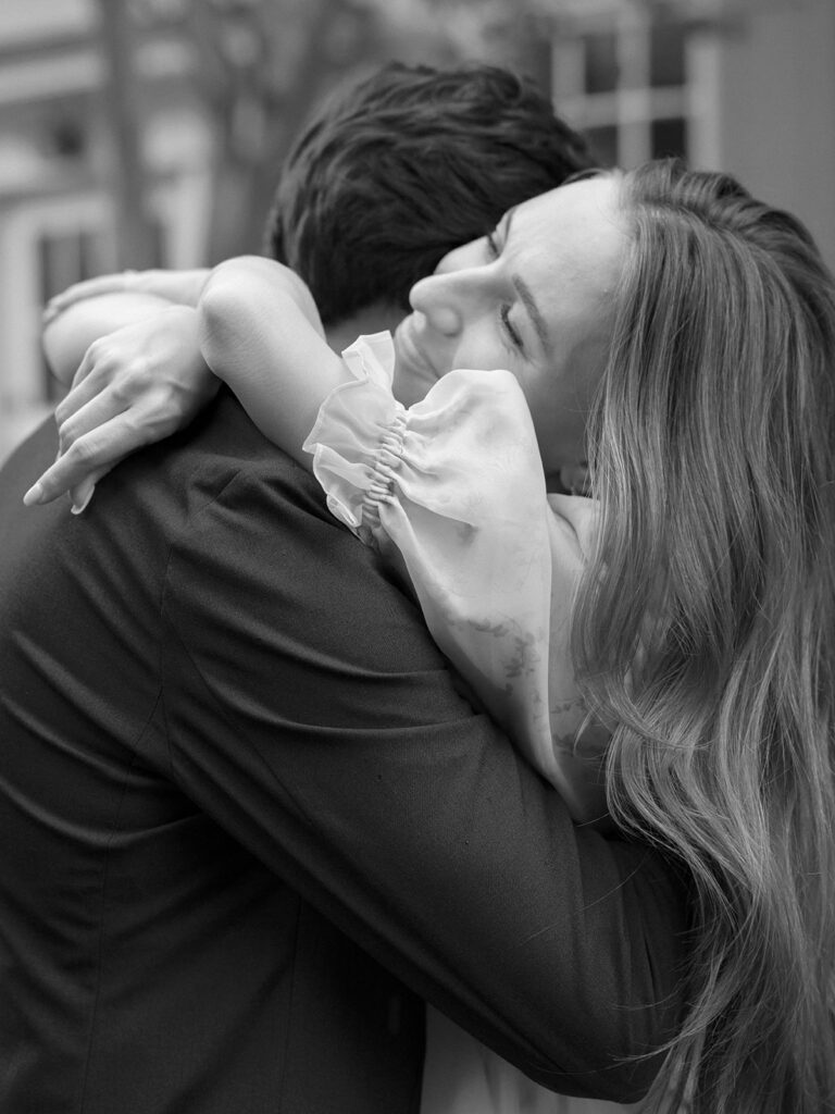 Couple walking through downtown Charleston during an engagement session