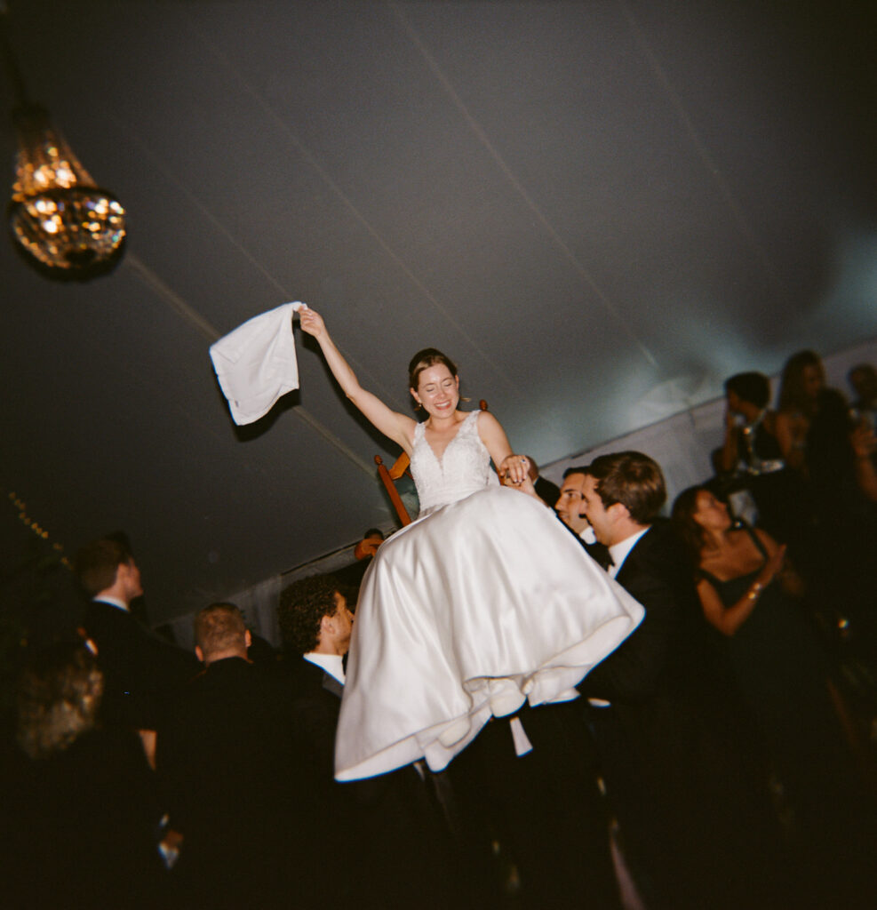 guests dancing under tent at Connecticut wedding