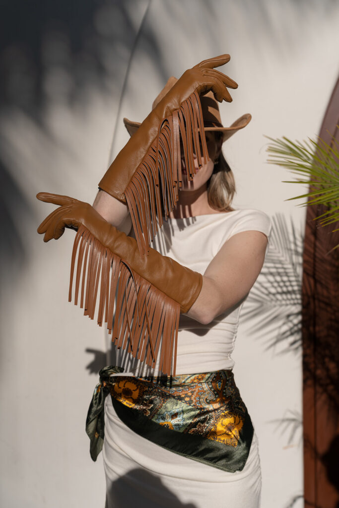 Western-inspired fringe gloves at Engage Summit Santa Barbara daytime event