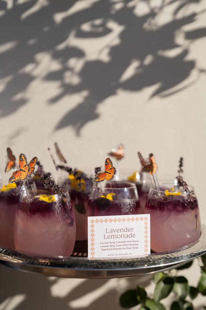 Lavender lemonade cocktails with butterfly garnish at Engage Summit Santa Barbara
