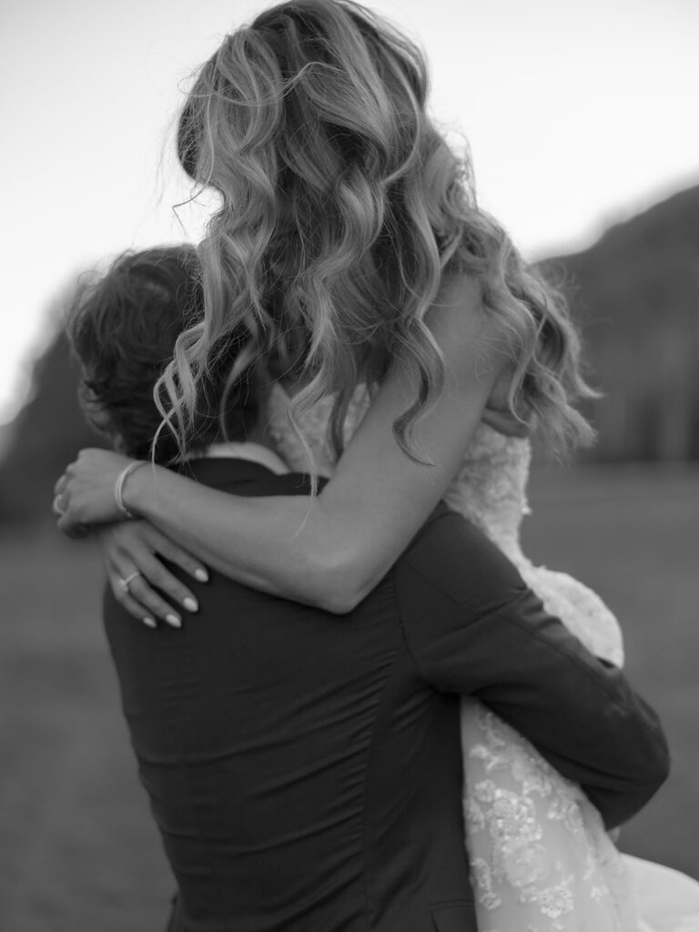 bride and groom hugging at Aspen Colorado wedding