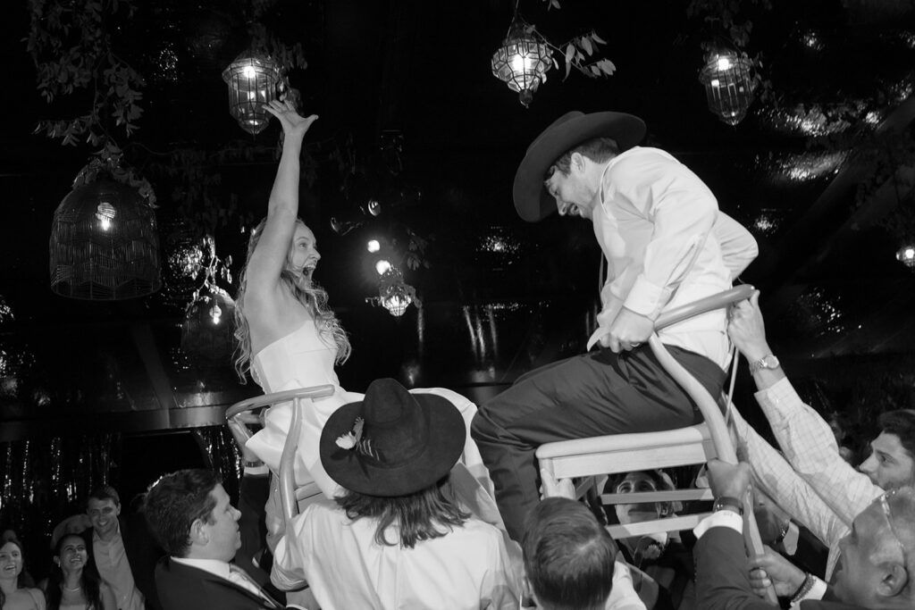 couple lifted on chairs during hora at Beaver Creek wedding