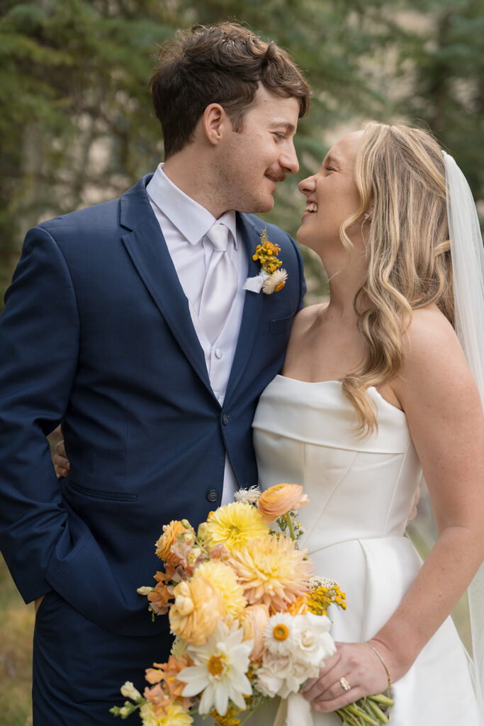 bride and groom smiling portrait at Beaver Creek Colorado wedding