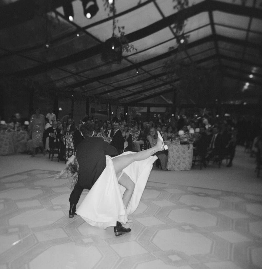 bride dipped during first dance at Park Hyatt Beaver Creek