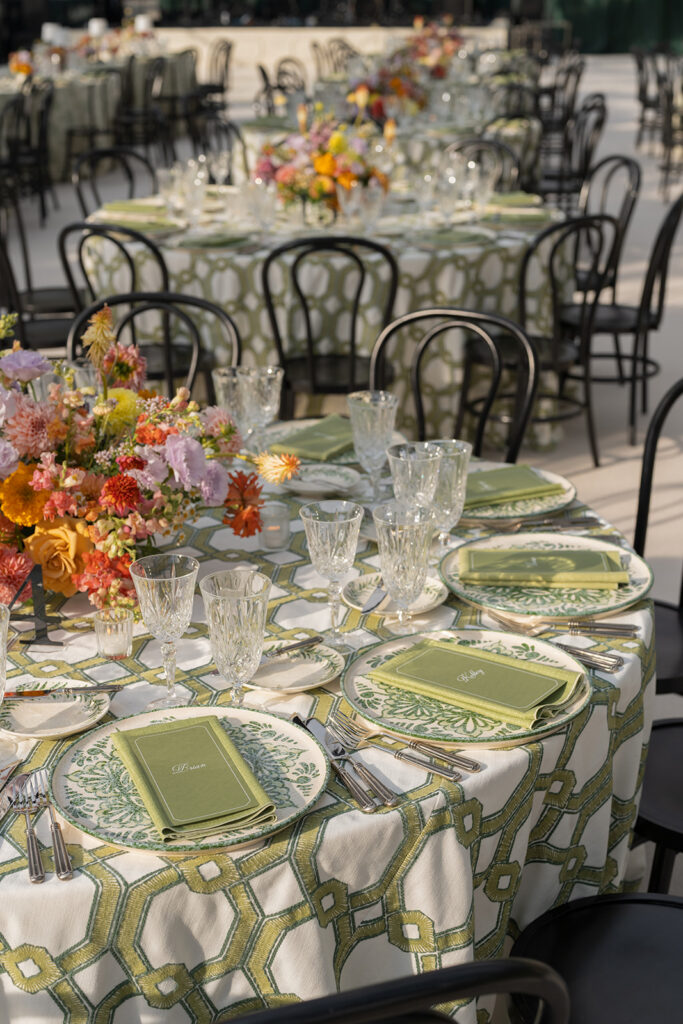 reception table with patterned linens and glassware Colorado