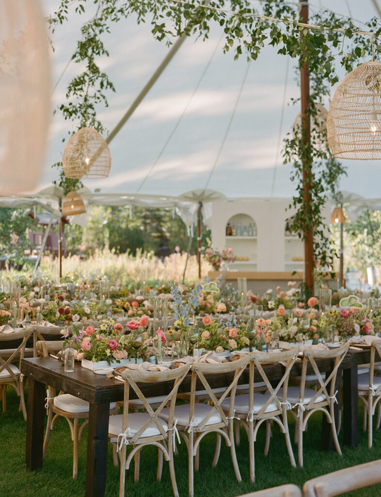 table design with colorful florals at Steamboat Springs wedding