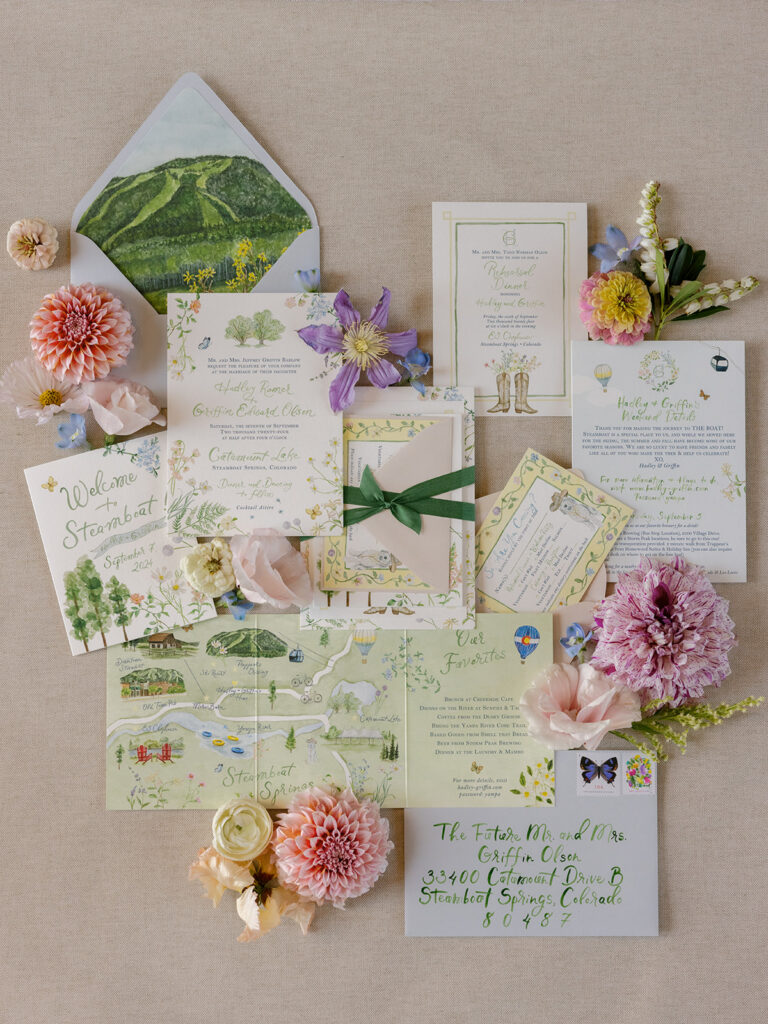 wedding invitation suite with illustrated map and florals