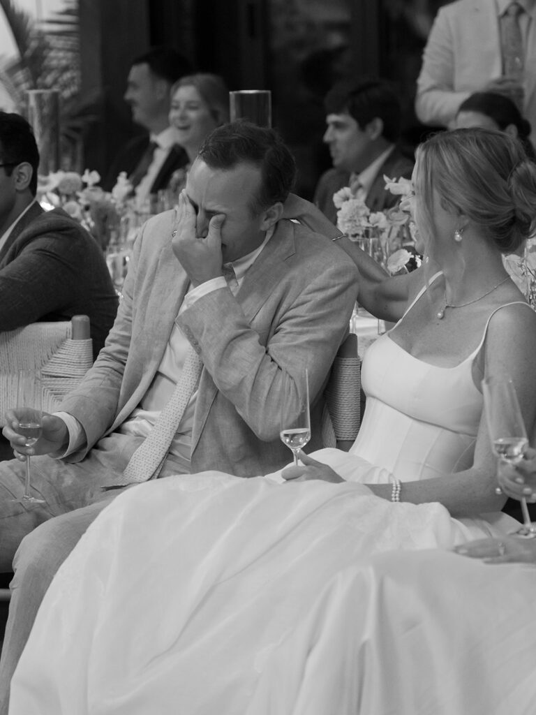 emotional candid at reception Charleston wedding