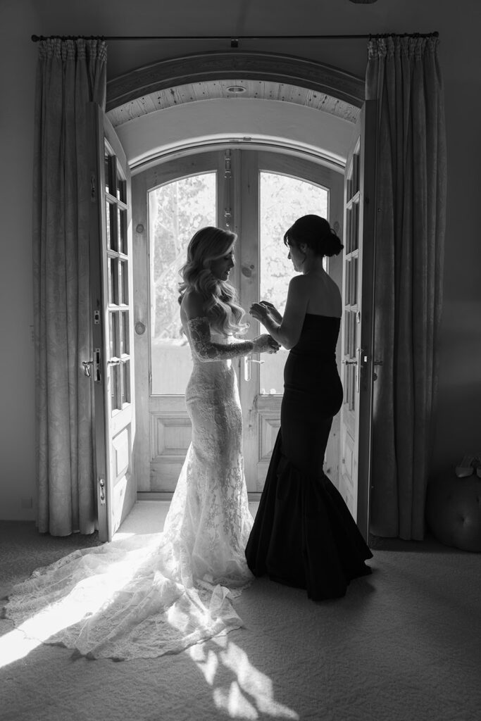 Bride getting ready with mom in Aspen Colorado