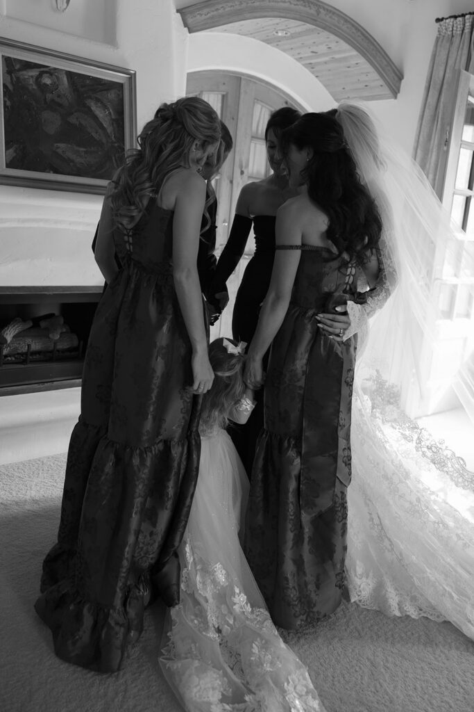 Bride getting ready with bridesmaids in Aspen Colorado