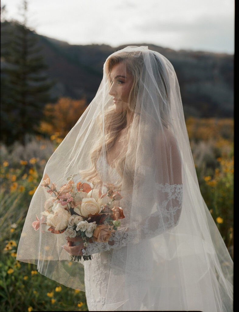 Bride portrait with veil in Aspen Colorado mountains