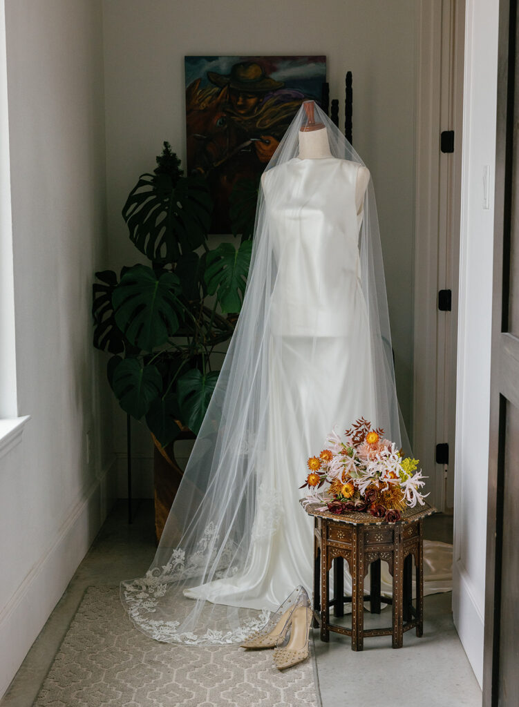 wedding dress and veil styled indoors before Texas wedding