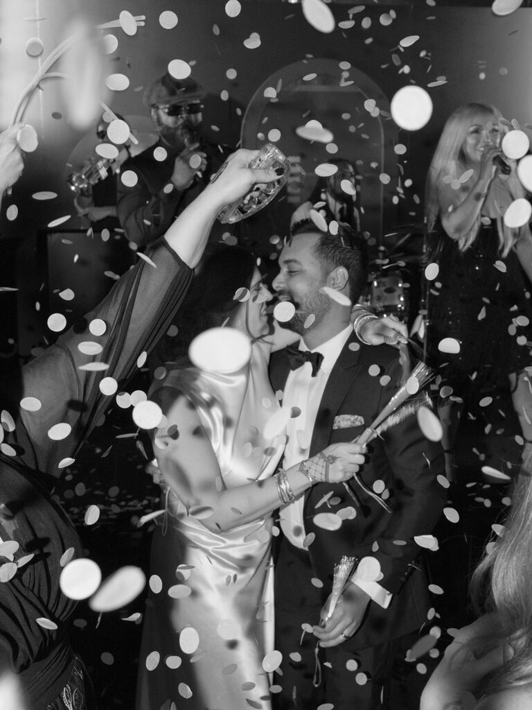 couple dancing with confetti during Texas wedding reception