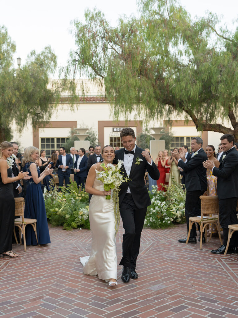 couple walking down aisle after ceremony downtown LA wedding