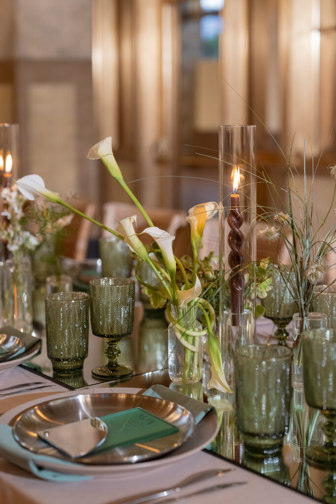 reception tables with green glassware at LA wedding